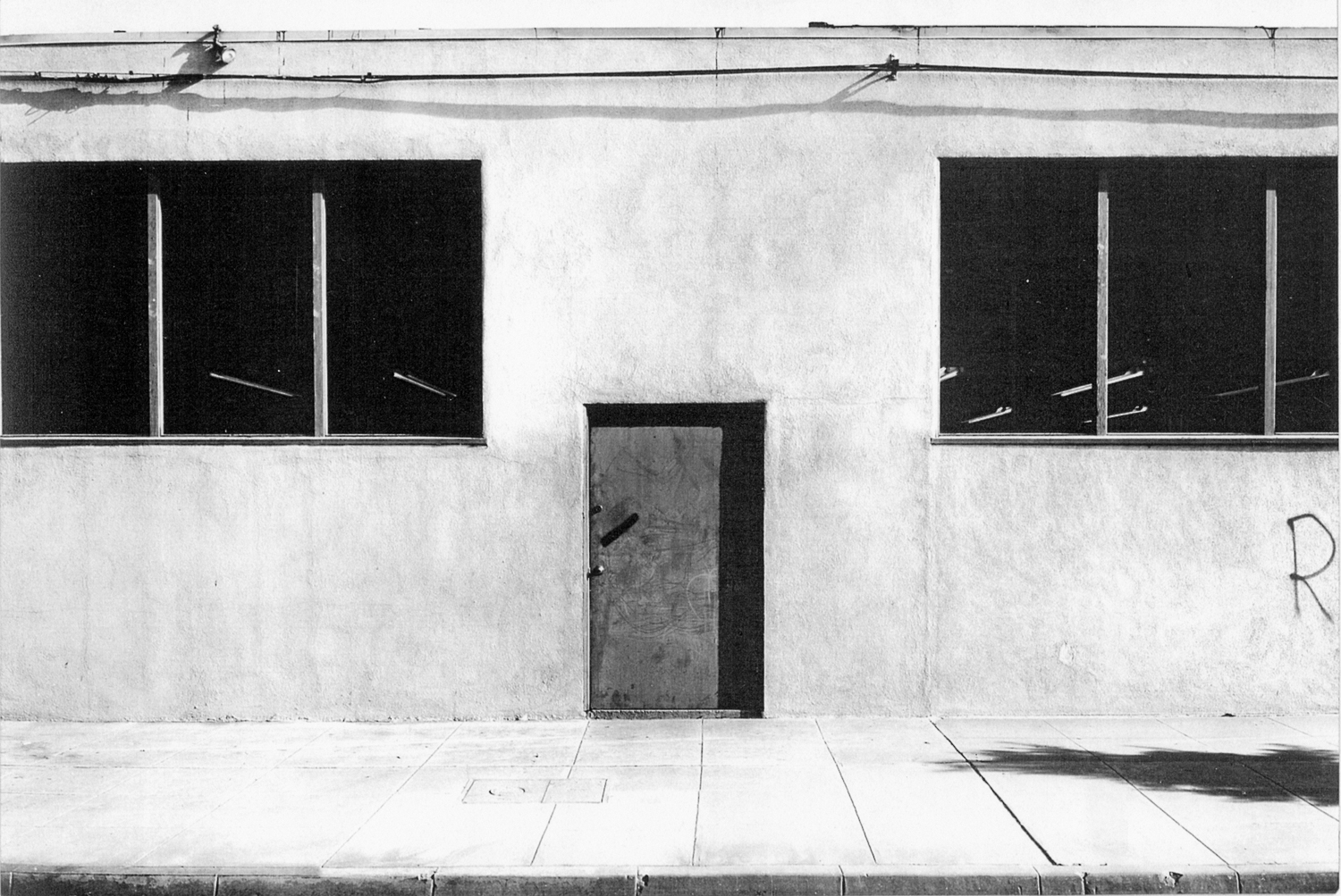 Lewis Baltz, Commercial Building, Pasadena, 1973. © Successors of Lewis Baltz. Used by permission. Courtesy of Gallery Luisotti, Santa Monica