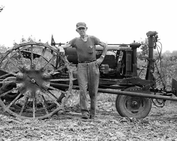 Bruce Crippen, Erwin Cutter John Deere Tractor, 1982. Black and white photograph, 11 x 14 inches. Courtesy of the artist