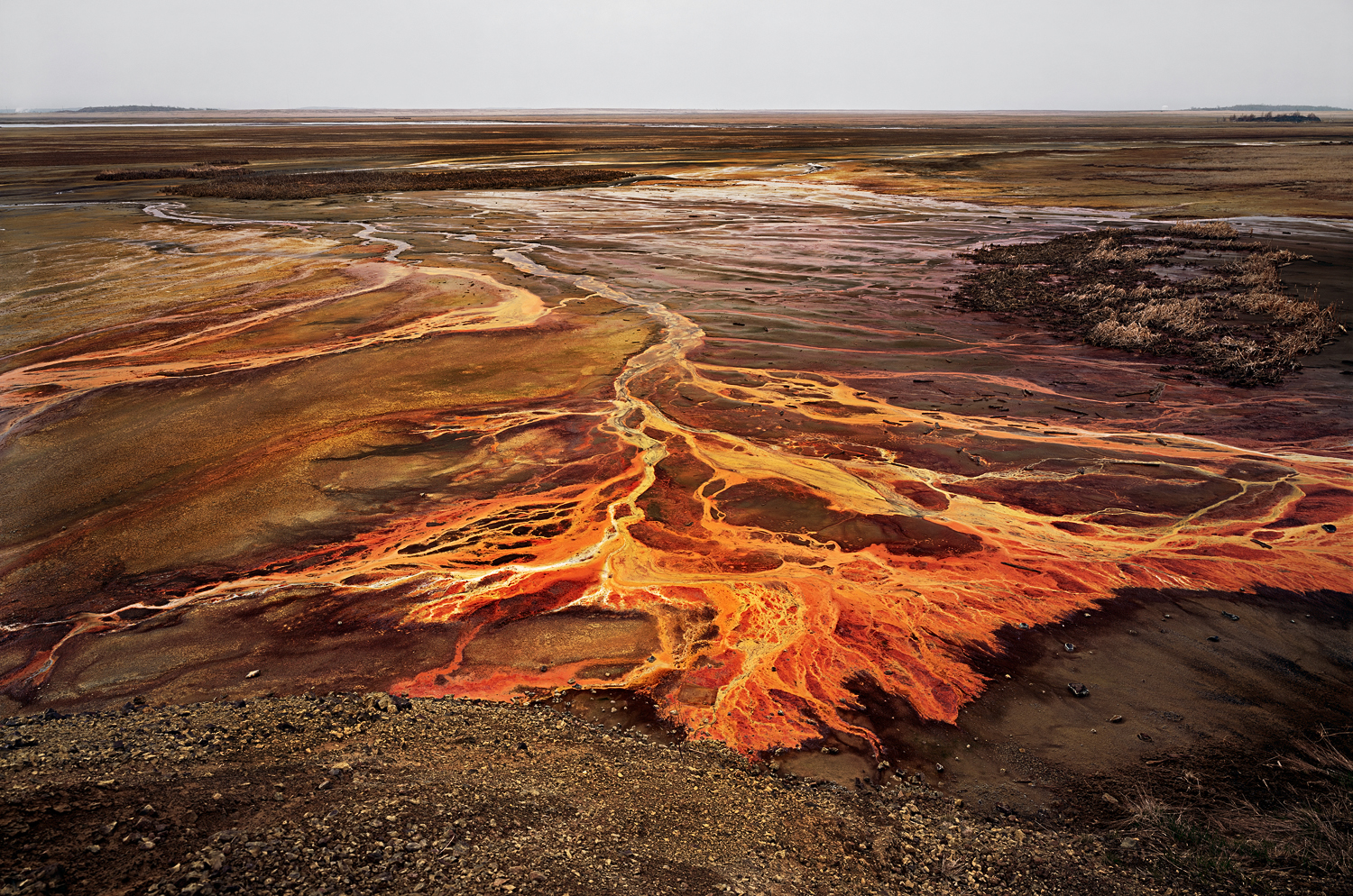 Edward Burtynsky, Nickel Tailings No. 30, Sudbury, Ontario, Canada, 1996. Digital chromogenic color print, 38½ x 60 inches. Courtesy of the artist, Nicholas Metivier Gallery, Toronto / Howard Greenberg Gallery & Bryce Wolkowitz Gallery, New York